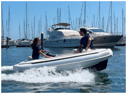 Couple cruising a marina in a tender