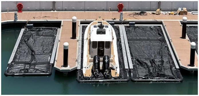 Hull moving through water with interceptor deployed