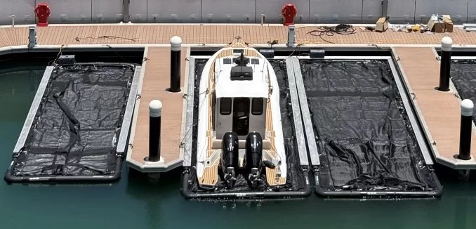 Hull moving through water with interceptor deployed