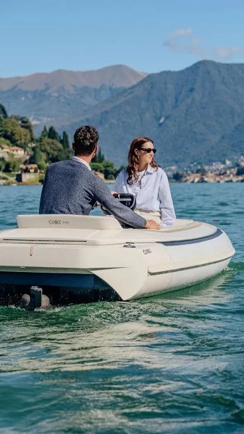 Leisure cruise on calm water with hills in the distance